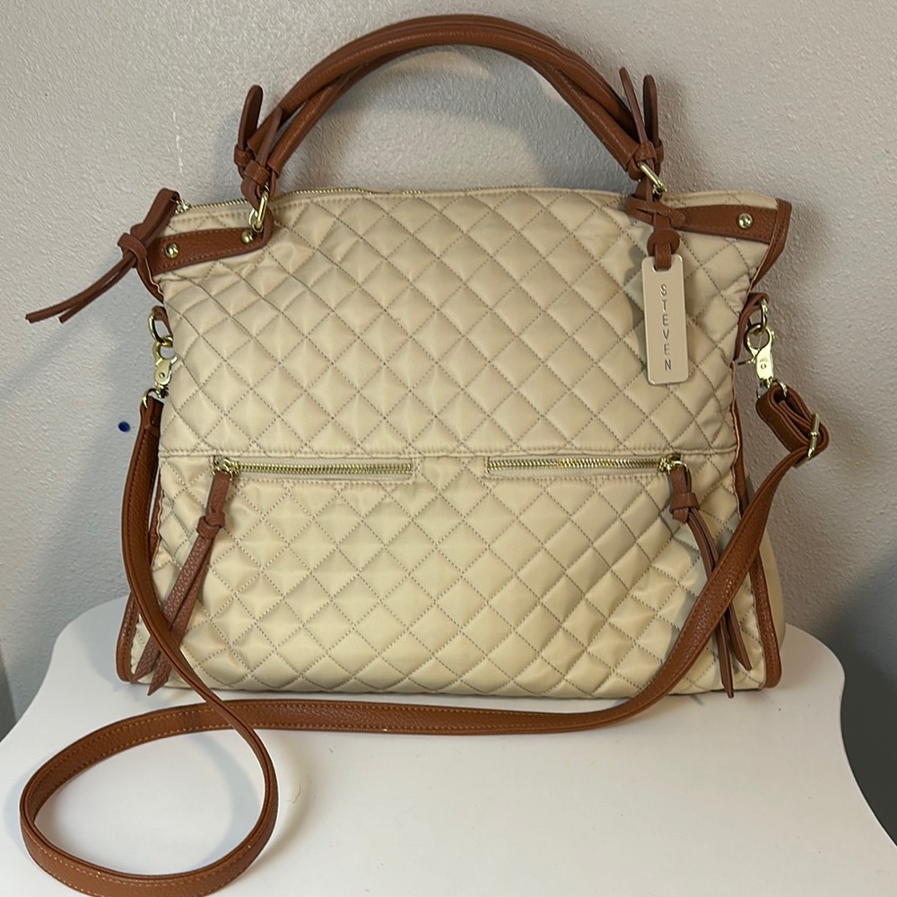 Steve Madden Cream Quilted Women's Bag with brown leather handles.